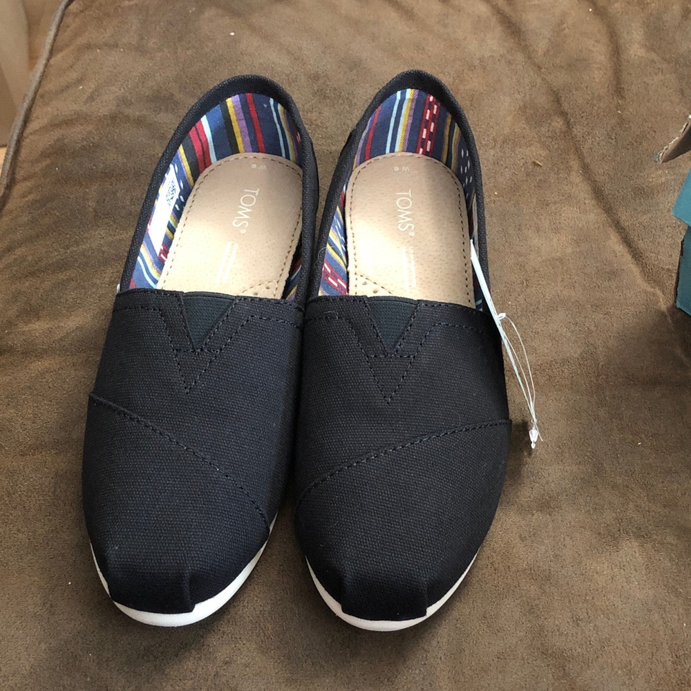 Toms Black Canvas Slip-On Flats with Multicolor Striped Lining